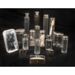 A COLLECTION OF THIRTEEN SILVER PLATED DRESSING BOTTLES