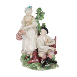 AN 18TH CENTURY DUESBURY & CO DERBY PORCELAIN FIGURE GROUP - A COUNTRY COUPLE