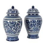 A PAIR OF BLUE AND WHITE GINGER JARS