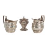 A GROUP OF THREE SILVER JUGS