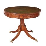 A REGENCY ROSEWOOD AND BRASS BANDED DRUM TABLE