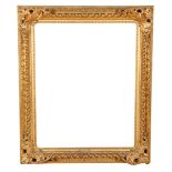A 19TH CENTURY GILTWOOD AND COMPOSITION PICTURE FRAME