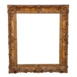 A GILTWOOD AND COMPOSITION PICTURE FRAME