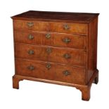 A GEORGE I WALNUT CHEST OF DRAWERS
