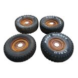 A SET OF FOUR SERIES I LAND ROVER WHEELS