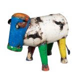 A TIN PLATE GARDEN SCULPTURE OF A COW BY AARON JACKSON