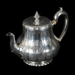A VICTORIAN SILVER TEAPOT AND MATCHING CREAM JUG
