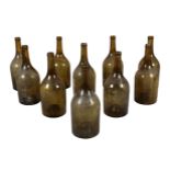 A GROUP OF TWELVE GREEN-GLASS WINE BOTTLES