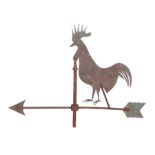 A CAST IRON AND COPPER WEATHER VANE