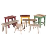 A GROUP OF SEVEN VINTAGE STOOLS