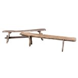 TWO WEATHERED OAK TRESTLE BENCHES