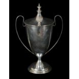 A GEORGE V SILVER TWO HANDLED LIDDED TROPHY