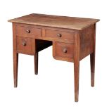 A STAINED PINE KNEEHOLE DRESSING TABLE