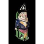 A STAFFORDSHIRE TOBY JUG IN THE FORM OF MR PUNCH