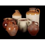 A GROUP OF SIX JUGS AND VESSELS