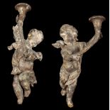 A PAIR OF 18TH CENTURY ITALIAN GILTWOOD CHERUB WALL SCONCES