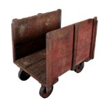 A CAST IRON AND PAINTED WOOD CART