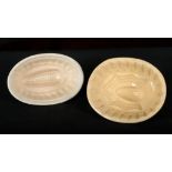 TWO AMERICAN BUFF GLAZED POTTERY JELLY MOULDS
