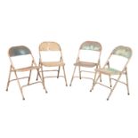 A MATCHED SET OF FOUR PAINTED METAL FOLDING CHAIRS