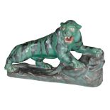 A FRENCH POTTERY MODEL OF A TIGER