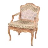 A LOUIS XV BEECH WOOD FAUTEUIL