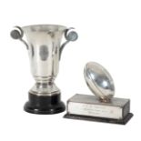A SILVER PLATED RUGBY TROPHY