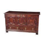 AN EARLY 18TH CENTURY PANELLED OAK MULE CHEST