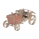 A VINTAGE PAINTED METAL MODEL TRACTOR