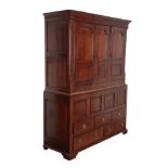 AN 18TH CENTURY OAK HALL CUPBOARD