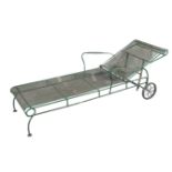 A GREEN-PAINTED WROUGHT METAL LOUNGER