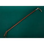 A VICTORIAN SILVER AND HORN MOUNTED RIDING CROP