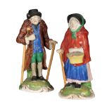 A PAIR OF 18TH CENTURY ENGLISH PORCELAIN FIGURES - AN ELDERLY COUPLE