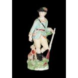 AN 18TH CENTURY DUESBURY & CO DERBY PORCELAIN FIGURE - SPORTSMAN WITH DOG AT FOOT