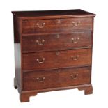 A GEORGE III OAK FACED CHEST OF DRAWERS