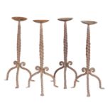 FOUR WROUGHT IRON PRICKET CANDLESTICKS