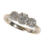 A TRIPLE DIAMOND FLOWERHEAD RING