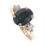 A THREE STONE SAPPHIRE AND DIAMOND RING