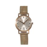 GARRARD & CO: A GENTLEMAN'S 9CT GOLD WRISTWATCH