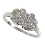 A DOUBLE FLOWERHEAD DIAMOND RING