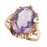 AN AMETHYST DRESS RING