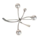 ART SMITH: A MODERNIST SILVER BROOCH