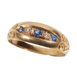 A SAPPHIRE AND DIAMOND GYPSY-STYLE RING