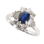 A SAPPHIRE AND DIAMOND CLUSTER RING