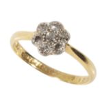 A DIAMOND FLOWERHEAD RING