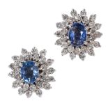 A PAIR OF TANZANITE AND DIAMOND CLUSTER EAR STUDS