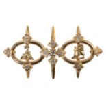 CARTIER: AN ARMORIAL GOLD AND DIAMOND DRESS ORNAMENT