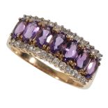 AN AMETHYST AND DIAMOND DRESS RING