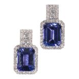 A PAIR OF TANZANITE AND DIAMOND CLUSTER EARRINGS,