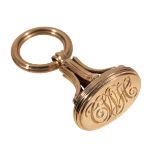 AN UNMARKED YELLOW GOLD FOB CHARM