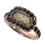 A 19TH CENTURY MOURNING RING